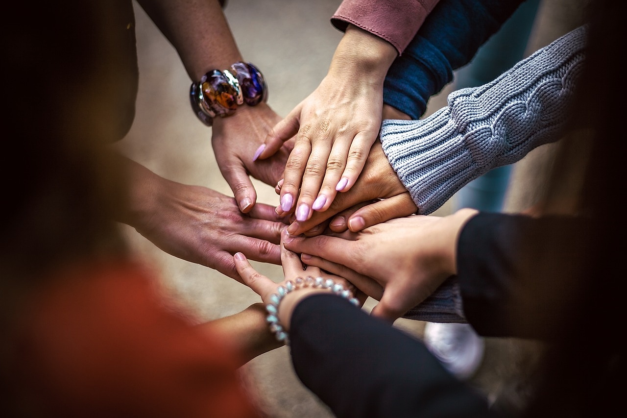 Group of people supporting each other in wellness habits